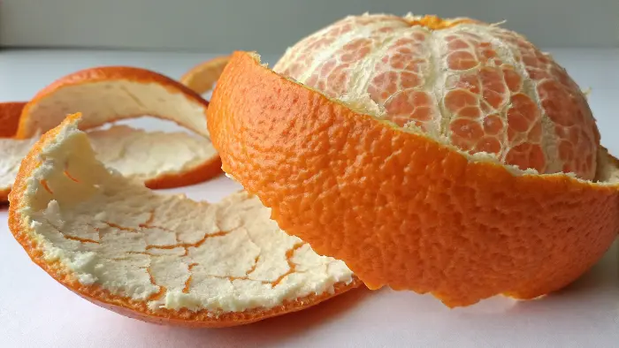 Close-up of orange peel texture on a plastic surface